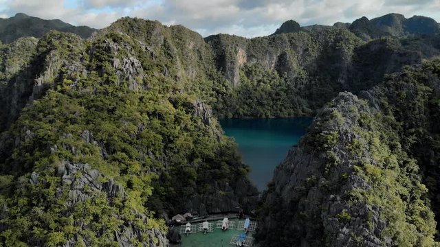 Aerial view of turquoise tropical lagoon with Karst limestone cliffs in Coron Island, Palawan, Philippines. UNESCO World Heritage Tentative List, Baracuda Lake