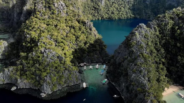 Aerial view of turquoise tropical lagoon with Karst limestone cliffs in Coron Island, Palawan, Philippines. UNESCO World Heritage Tentative List, Baracuda Lake