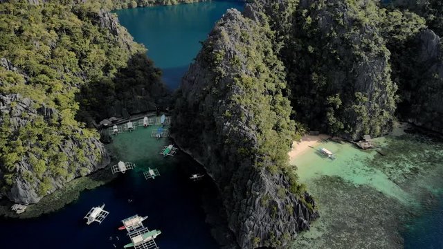 Aerial view of turquoise tropical lagoon with Karst limestone cliffs in Coron Island, Palawan, Philippines. UNESCO World Heritage Tentative List, Baracuda Lake