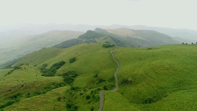 Foggy Aerial View of the Riverston Sri Lanka. Road Surrounded by Green Plains. December 2018.