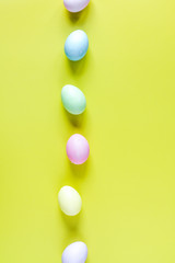 Easter concept on yellow background top view mockup