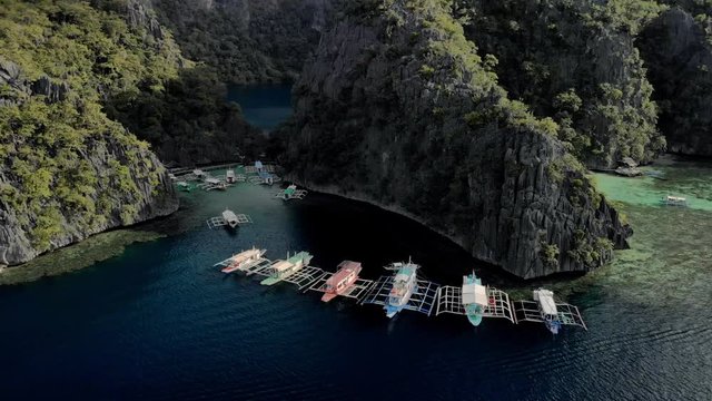 Aerial view of turquoise tropical lagoon with Karst limestone cliffs in Coron Island, Palawan, Philippines. UNESCO World Heritage Tentative List, Baracuda Lake