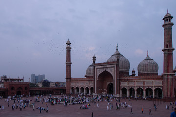 Iconic Jama Masjid of New Delhi India, Ramadan 2020, Eid Mubarak / Old Delhi / People offering prayer during namaz at the famous mosque. Empty, full of people.