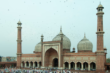 Iconic Jama Masjid of New Delhi India, Ramadan 2020, Eid Mubarak / Old Delhi / People offering prayer during namaz at the famous mosque. Empty, full of people.