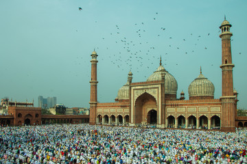 Iconic Jama Masjid of New Delhi India, Ramadan 2020, Eid Mubarak / Old Delhi / People offering prayer during namaz at the famous mosque. Empty, full of people.