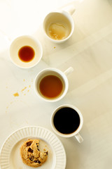 lot of cups of coffees on white marble table, hard work concept