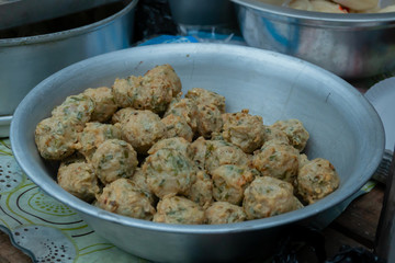 Fried pork snacks being sold at Territy Bazar, Kolkata, West Bengal, India