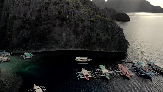 Aerial view of turquoise tropical lagoon with Karst limestone cliffs in Coron Island, Palawan, Philippines. UNESCO World Heritage Tentative List, Baracuda Lake