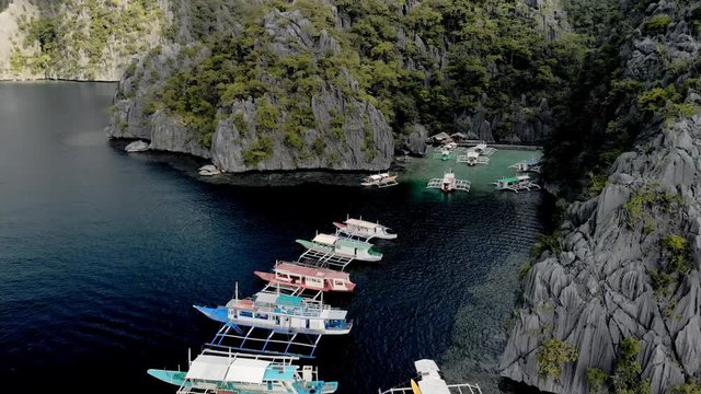 Aerial view of turquoise tropical lagoon with Karst limestone cliffs in Coron Island, Palawan, Philippines. UNESCO World Heritage Tentative List, Baracuda Lake