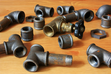 Plumbing old cast iron fittings
