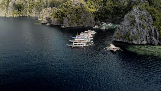 Aerial view of turquoise tropical lagoon with Karst limestone cliffs in Coron Island, Palawan, Philippines. UNESCO World Heritage Tentative List, Baracuda Lake