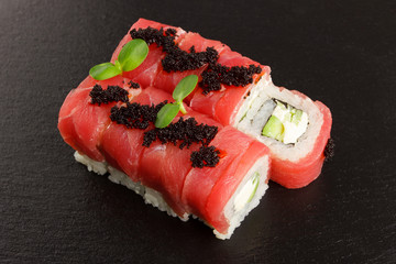 Japanese food: Set of salmon sushi and rolls with salmon and eel