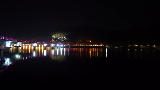 Night view of Andong river and Wolyeonggyo bridge in Andong city, South Korea.