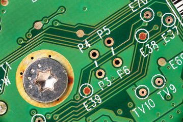 printed green computer circuit board macrophoto