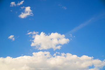 Naklejka na ściany i meble background clear blue sky with white clouds
