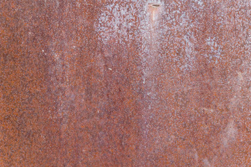empty background of old rusty metal with a brown tinge