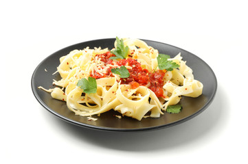 Plate with tasty pasta isolated on white background