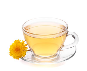 Cup of healthy dandelion tea on white background