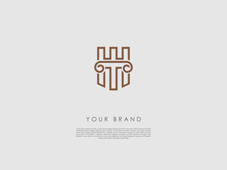 a bronze business logo that have an ancient column, letter t and h and a piece of a wall of a castle at the background