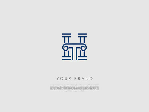 a blue business logo which represents ancient columns, a decorative capital and the letters h and t