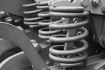 Damping springs of a modern cultivator. © PhotoBetulo
