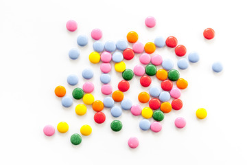 Color candy on white background top view