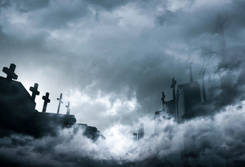 Cemetery or graveyard in the night with dark sky and white clouds. Haunted cemetery. Spooky and scary burial ground. Horror scene of graveyard. Funeral concept. Sadness, lament and death background. - obrazy, fototapety, plakaty