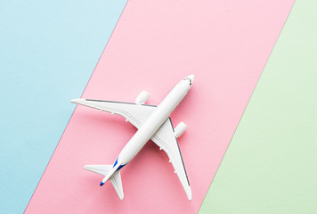 Airplane on pastel background
