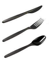 Four Sets of Vibrant Plastic Forks, Knives and Spoons in Black. Isolated on White with a Clipping Path.