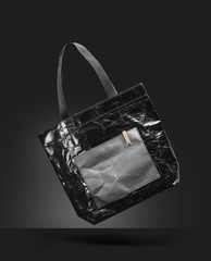 woman's handbag isolated on a black background