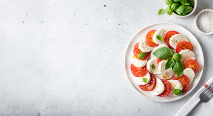 A traditional dish of Italian cuisine caprese. Top view, place for text, horizontal orientation,...