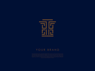 a business logo which has straight and 'L' shaped lines and letter 'T' in the middle and looks like a decorative ancient column with a capital