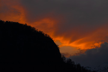Sunset over small hill in Bohinj valley