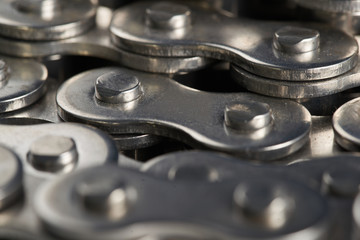 Roller chainon on a silver background