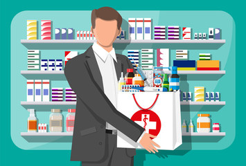 Man holding drugstore bag in front of pharmacy shop. Set of bottles, tablets, pills, capsules and sprays for illness and pain treatment. Medical drug, vitamin, antibiotic. Flat vector illustration