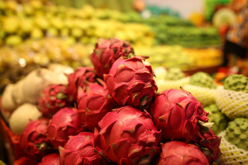 Dragon fruit on the counter at the market.