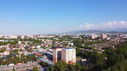 Fototapeta na wymiar Scenary arial city landscape with sky and mountains.