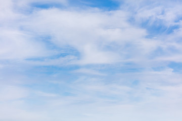 White clouds on a blue sky as background