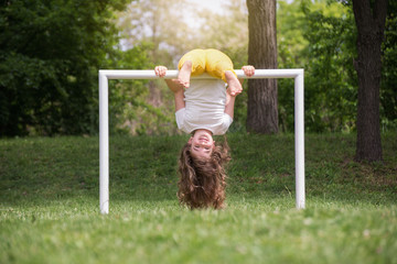 Girl is playing on the playground
