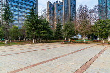 empty, modern square and skyscrapers in modern city