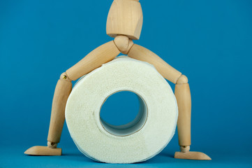 the wooden man and a roll of toilet paper, digestive problems