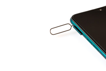 Sim card tools, Eject pin sim card tray for smartphones isolated on white background. Selective focus.