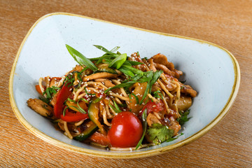 Noodles with chicken, soy and oyster sauce, sesame oil, ginger, garlic, fresh coriander leaves.