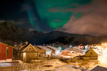 Northern lights above the highest peaks of Lofoten islands, Norway