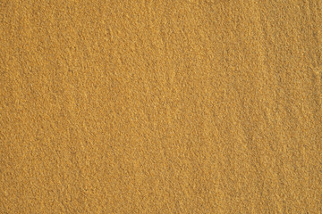 Sand beach texture background, close up top view