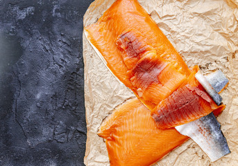 Salmon fillets, Slices of red fresh fish on black board