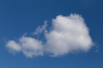 view on cumulus cloud in a blue sky