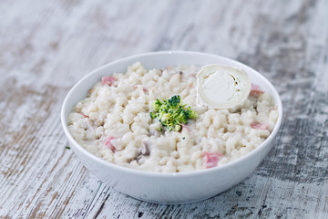 A homemade risotto with mushrooms and bacon