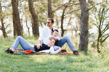 Happy family dad mom and son having fun and playing