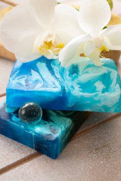 blue set for bath with sea organic soap, vertical image